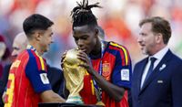 Nico Williams of Spain kisses the winner's trophy following the FIFA World Cup 2026 Final against Argentina at New York New Jersey Stadium on July 19, 2026 in East Rutherford, United States