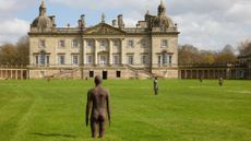 Cast-iron figures by Antony Gormley in the exhibit 'Time Horizon' at Houghton Hall, Norfolk