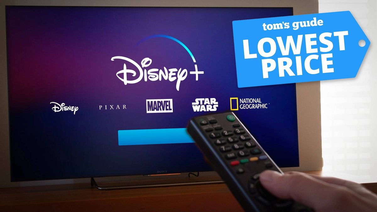 Remote pointed at a television with Disney Plus splash screen and a Tom&#039;s Guide deal tag