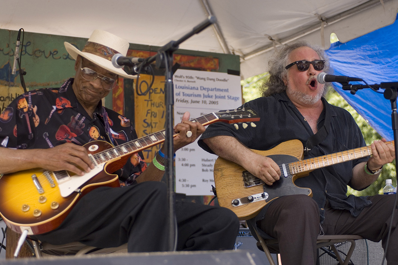 American Blues musicians Hubert Sumlin (1931 - 2011) and Bob Margolin play guitar as they perform onstage in Grant Park, Chicago, Illinois, June 10, 2005. (Photo by Paul Natkin/Getty Images)