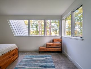 bedroom interior at Lake Placid A-Frame by Strand Design