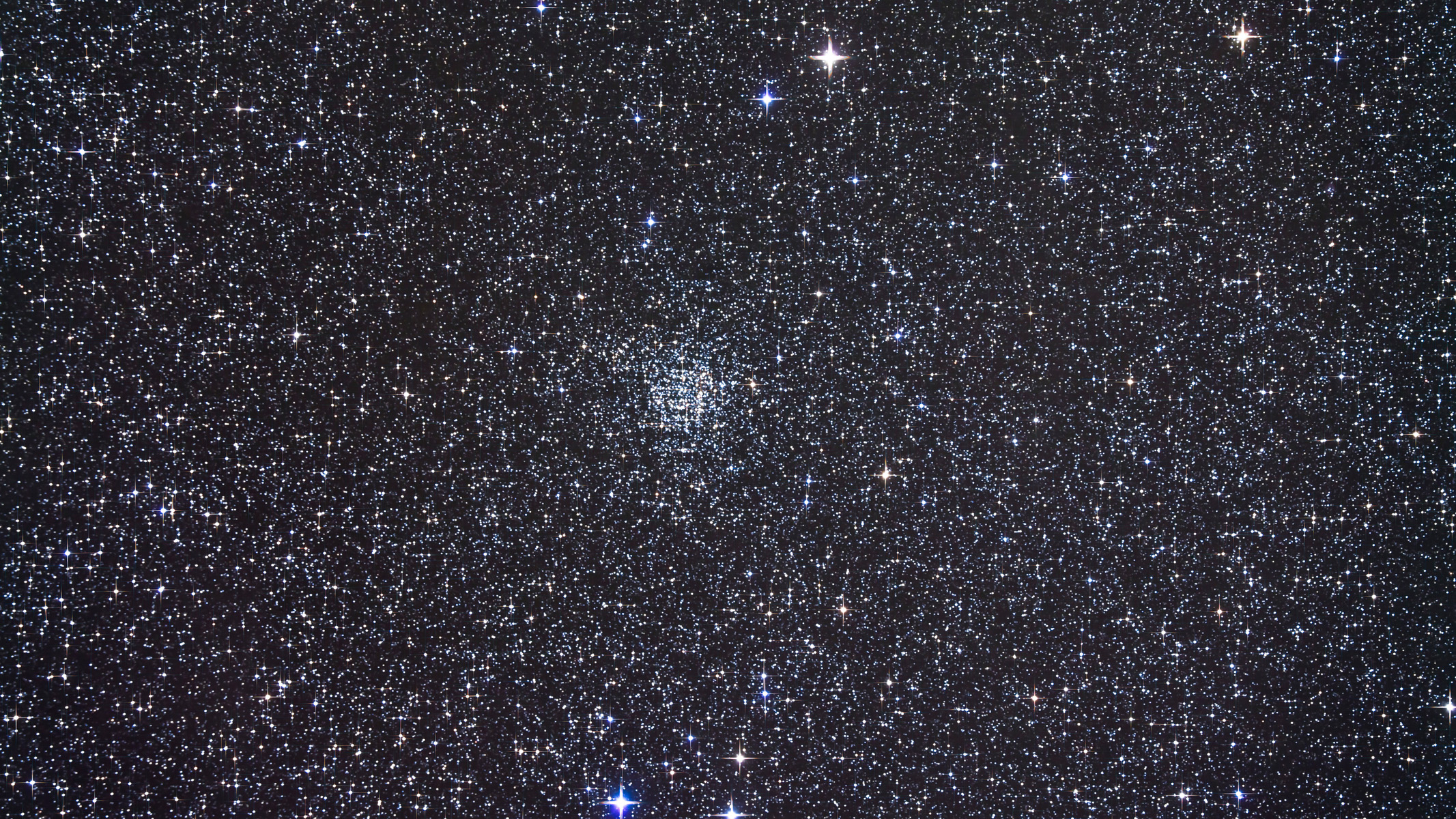 NGC 7789 in a starry sky