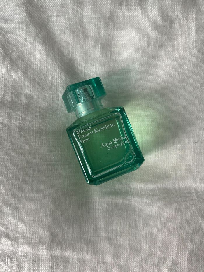 Marine perfumes on a white linen background