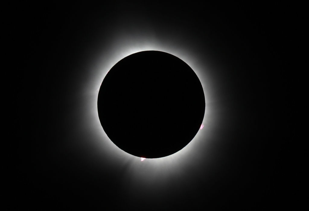 Thhe sun reaches totality during the eclipse on April 08, 2024 in Houlton, Maine. Millions of people have flocked to areas across North America that are in the 