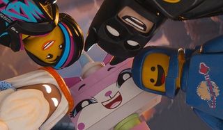 The Lego Movie Vitruvius Unikitty Benny Batman and Wyldstyle in a face down huddle