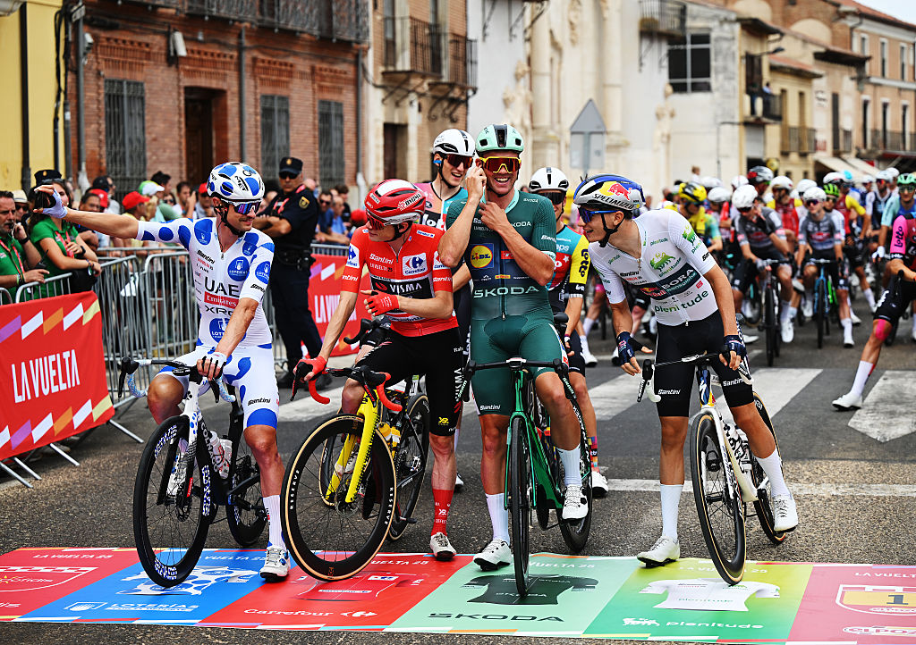 RUEDA, SPAIN - SEPTEMBER 12: (L-R) Jay Vine of Australia and UAE Team Emirates - XRG - Polka dot Mountain Jersey, Jonas Vingegaard of Denmark and Team Visma | Lease a Bike - Red Leader Jersey, Mads Pedersen of Denmark and Team Lidl - Trek - Green Points Jersey and Giulio Pellizzari of Italy and Team Red Bull - BORA - hansgrohe - White Best Young Rider Jersey prior to the La Vuelta - 80th Tour of Spain 2025, Stage 19 a 161.9km stage from Rueda to Guijuelo/ #UCIWT / on September 12, 2025 in Rueda, Spain. (Photo by Dario Belingheri/Getty Images)
