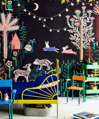 kids bedroom with black wall paint decorated by glossy animal stickers