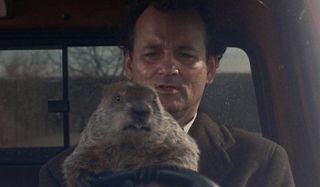 Groundhog Day Bill Murray drives with a groundhog