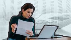 Woman sorting tax return 