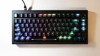 Lemokey L5 HE 8K gaming keyboard with RGB enabled on a desk.