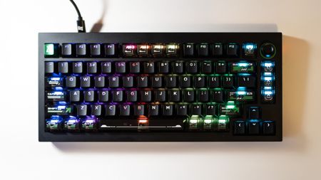 Lemokey L5 HE 8K gaming keyboard with RGB enabled on a desk.