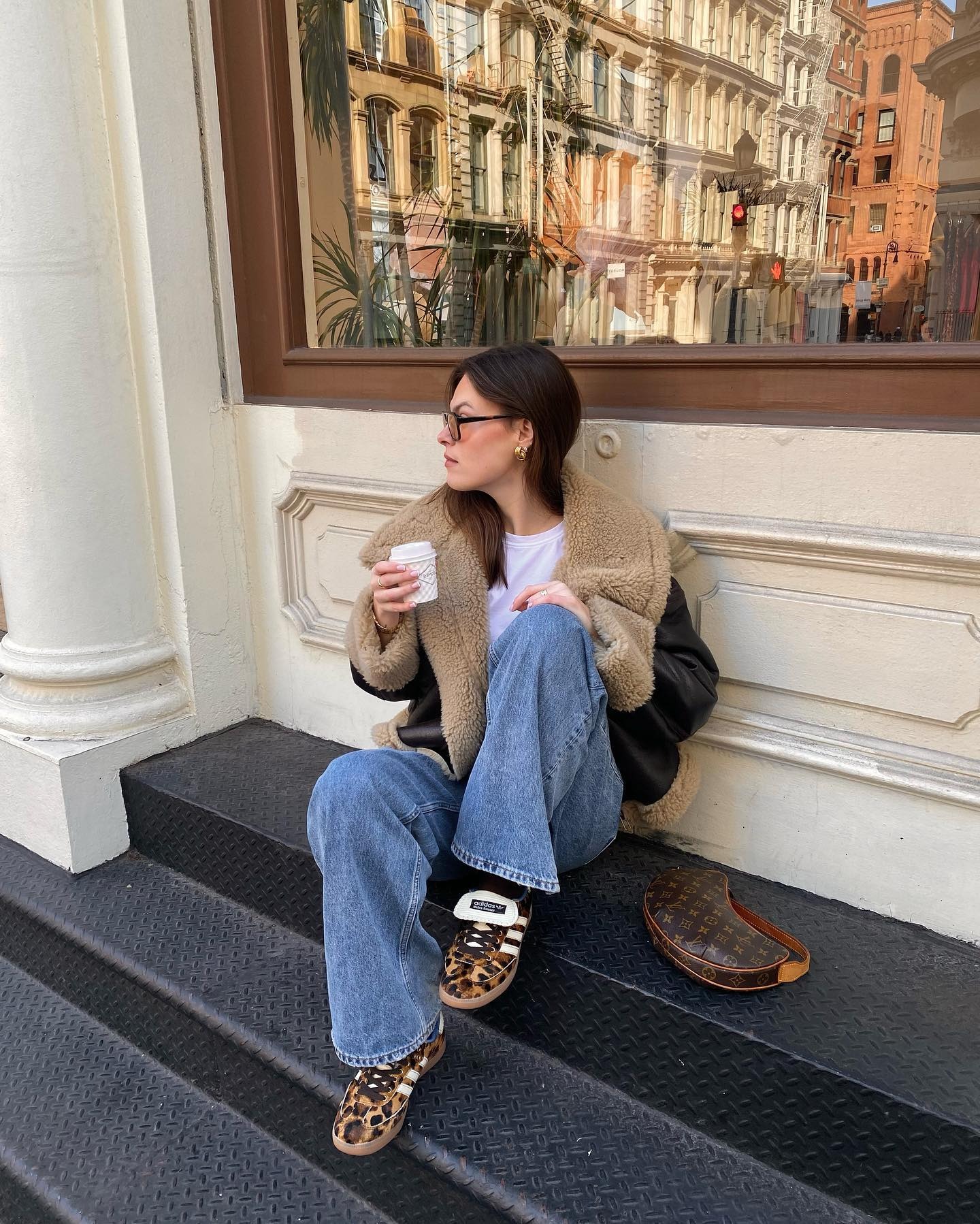 @maggie_mccormack wearing animal-print sneakers