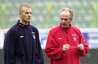 27 Mar 2001; David Beckham and Sven Goran Eriksson of England after the training session in the stadium in Tirana, Albania . Digital Image. Mandatory Credit: Ross Kinnaird/ALLSPORT