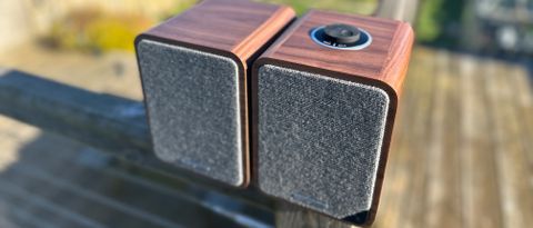 Ruark MR1 MkII speakers on a wooden surface