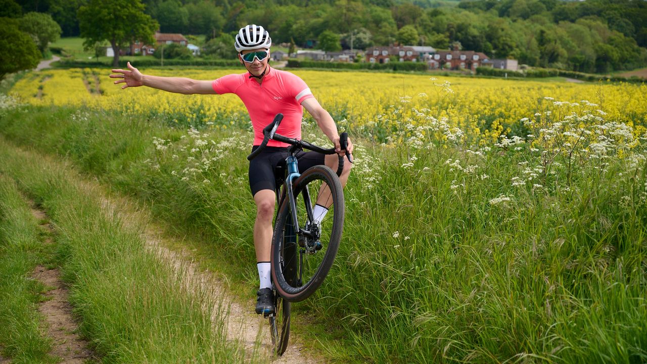 Joe Baker wheelies in a gravel bike