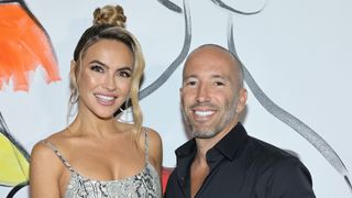 Chrishell Stause and Jason Oppenheim attend alice + olivia by Stacey Bendet during September 2021 - New York Fashion Week: The Shows on September 10, 2021 in New York City.