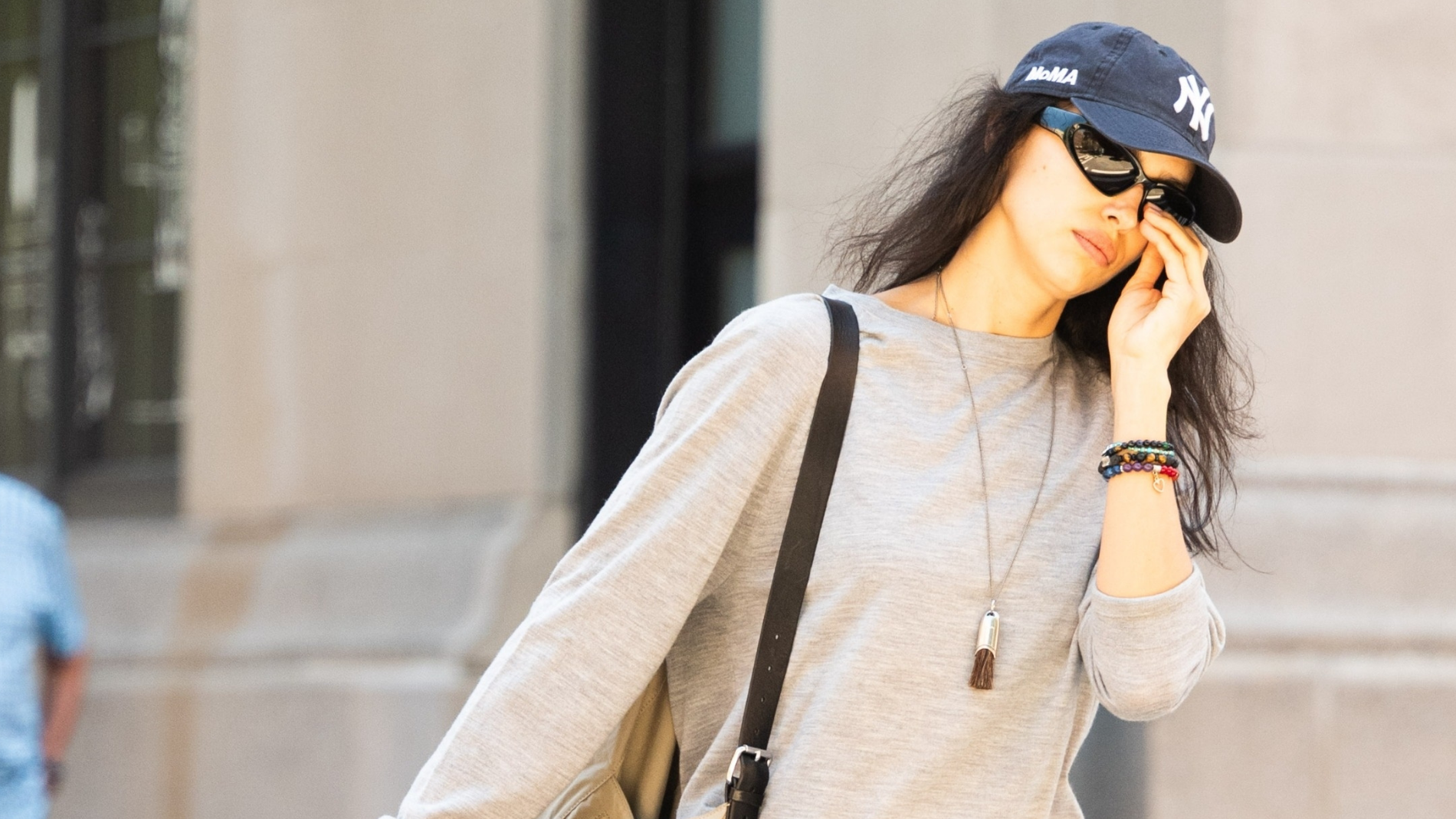 *EXCLUSIVE* New York, NY Irina Shayk was seen enjoying a casual walk with her puppies in New York City. She wore ripped acid-washed jeans, a gray sweater, Adidas sneakers, a MOMA cap, and a bracelet bearing her name, while her dogs were attached to a Louis Vuitton leash. Pictured: Irina Shayk BACKGRID USA 8 JUNE 2026 