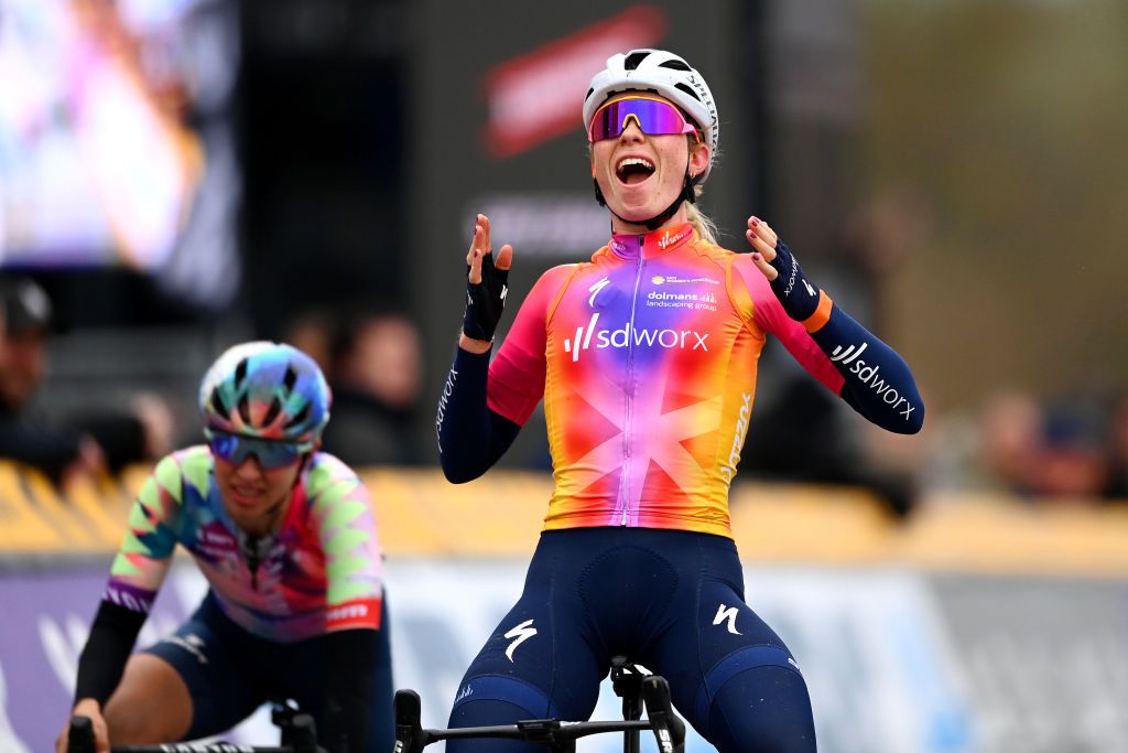 OUDENAARDE BELGIUM APRIL 02 Demi Vollering of The Netherlands and Team SD Worx celebrates at finish line crossing the finish line on second place during the 20th Ronde van Vlaanderen Tour des Flandres 2023 Womens Elite a 1566km one day race from Oudenaarde to Oudenaarde UCIWWT on April 02 2023 in Oudenaarde Belgium Photo by Tim de WaeleGetty Images