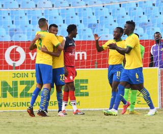 Mothobi Mvala celebrates his goal with teammates