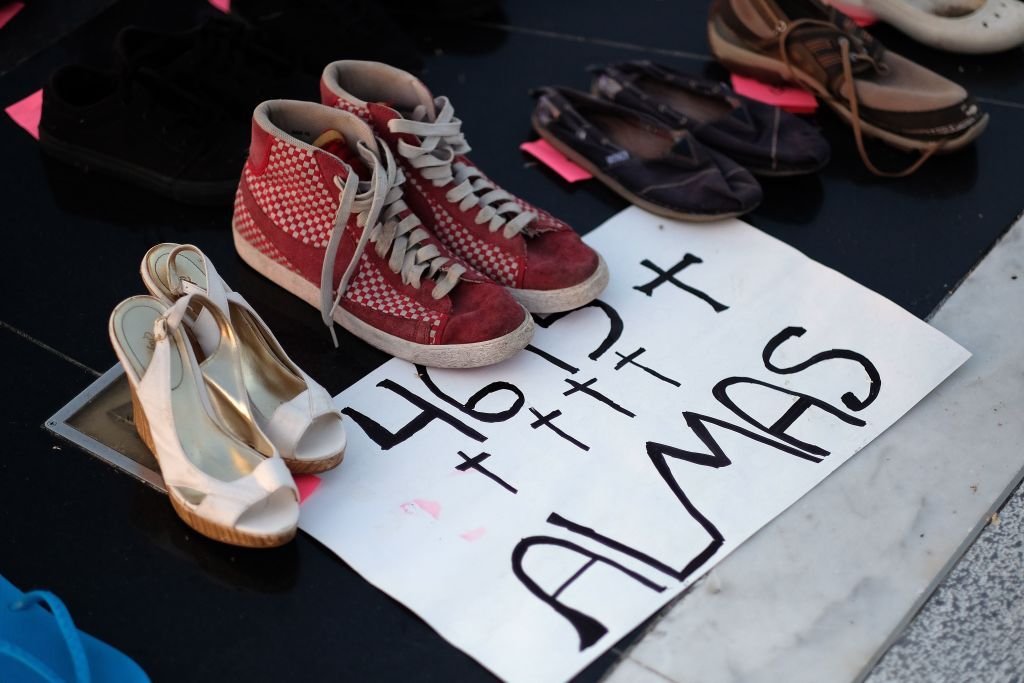 View of displayed shoes in memory of those killed by Hurricane Maria in front of the Puerto Rican Capitol, in San Juan, on June 1, 2018. -