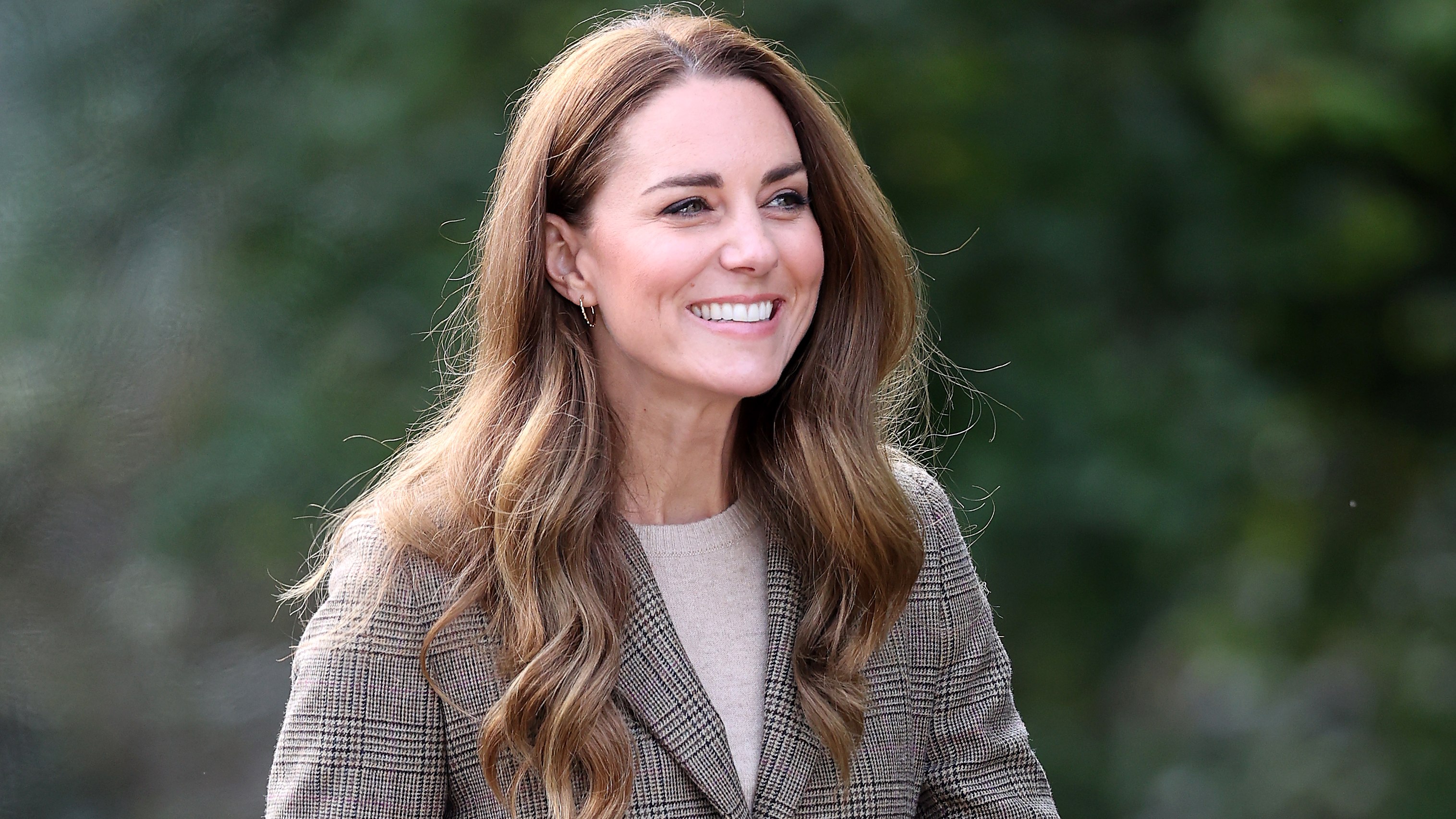 Catherine, Princess of Wales smiles as she arrives to embark on a boat trip on Lake Windermere in 2021
