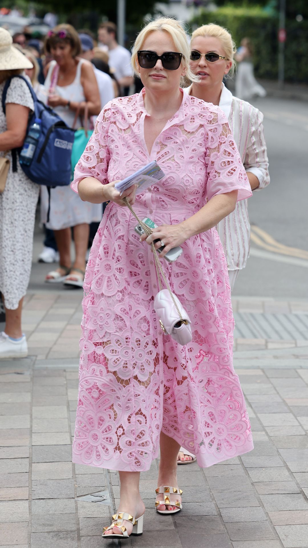 rebel wilson wearing a pink temperley dress and sunglasses while at wimbledon