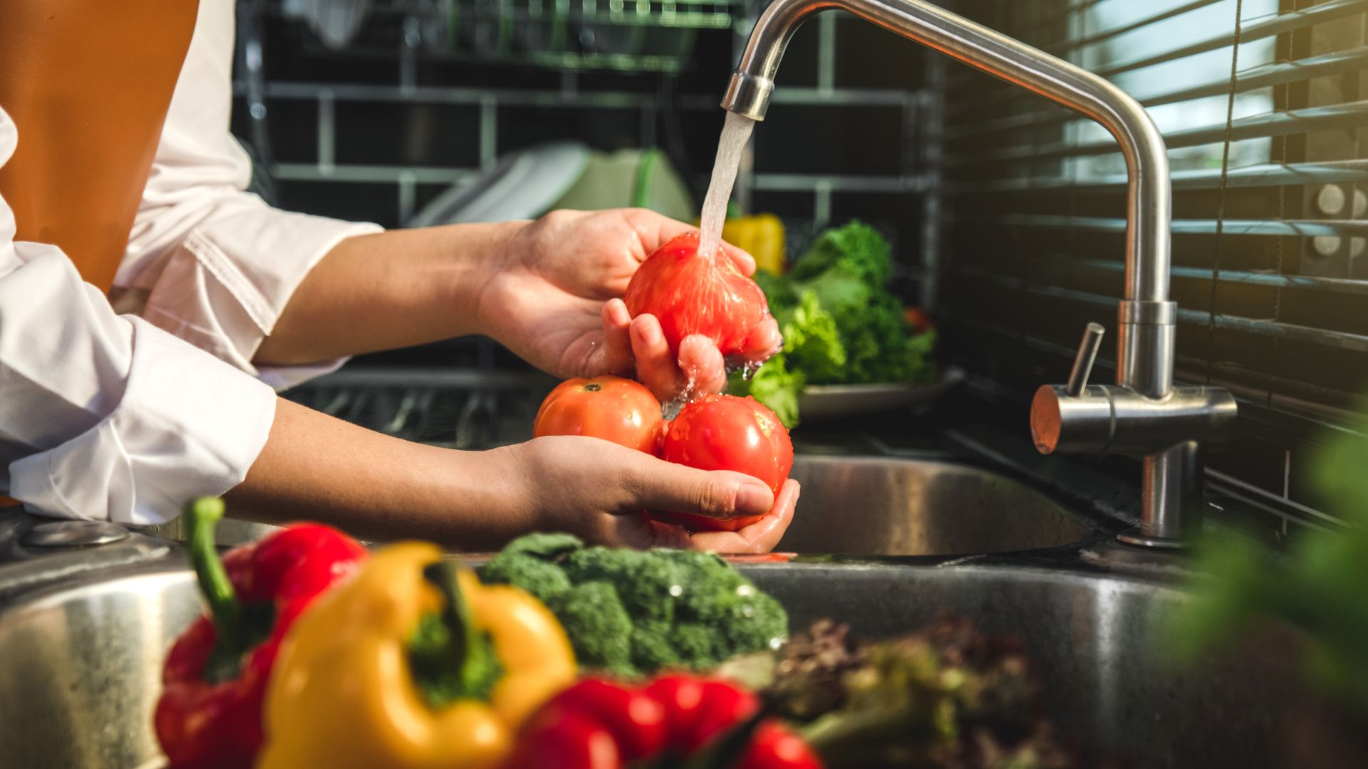 Woman washing veg