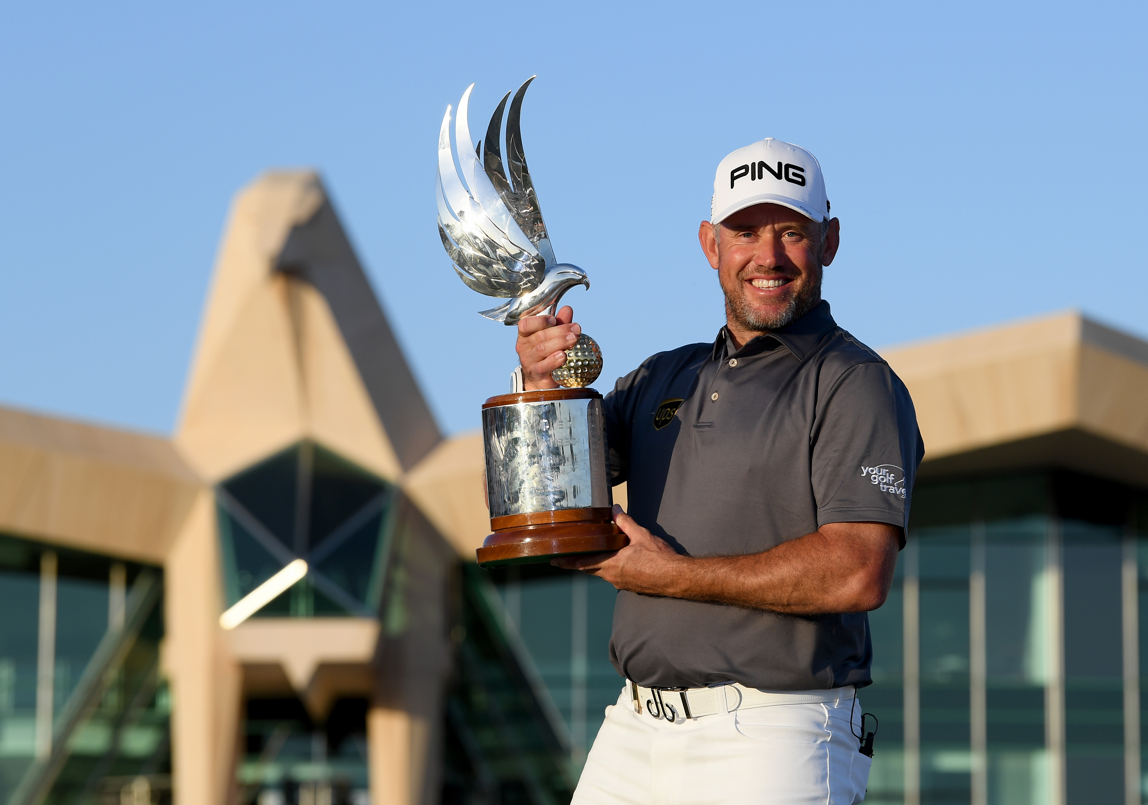 Lee Westwood holds the Abu Dhabi HSBC Championship trophy