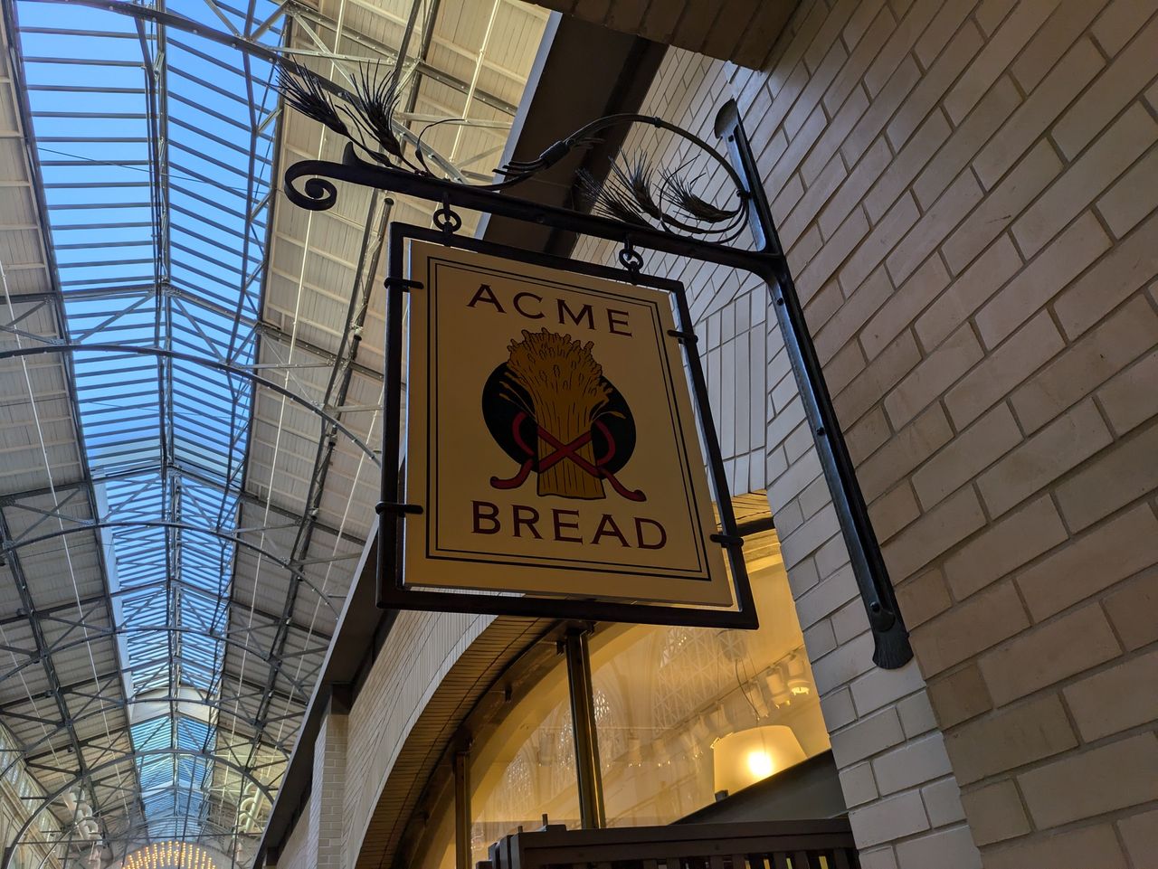 photo of Acme Bread sign in indoor market shot by Pixel 8a