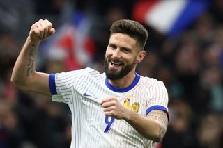 Olivier Giroud celebrates a goal for France against Chile in March 2024.