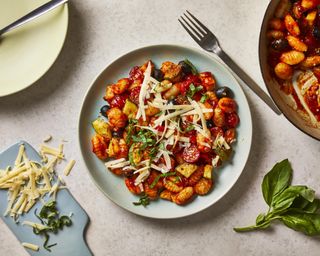 tomato gnocchi dish with basil used in it