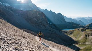 Ultra runner Jake Catterall on a trail in the Alps