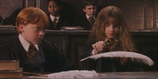 Ron Weasley observes Hemione Granger's mastering of spells enviously