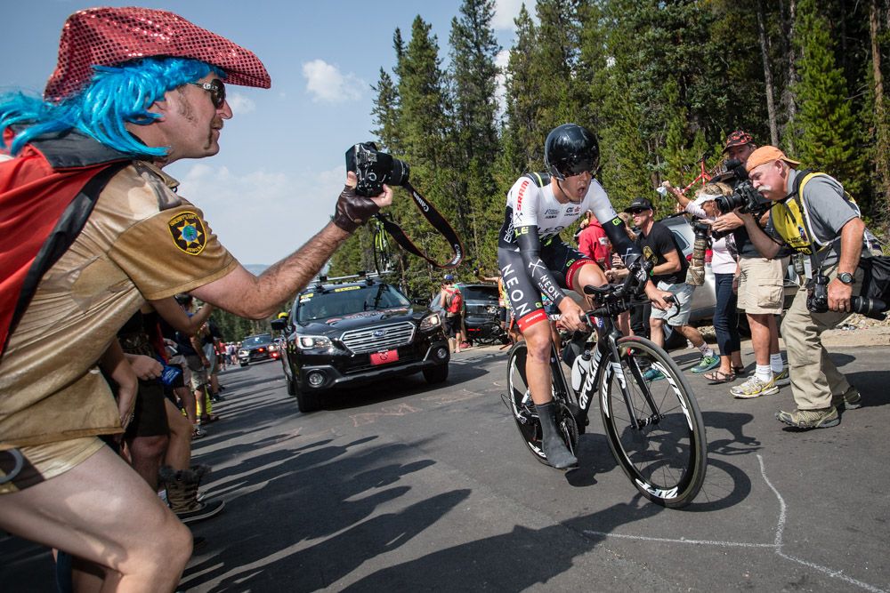 Daniel Eaton (Axeon) gets his photo taken near the top of the climb