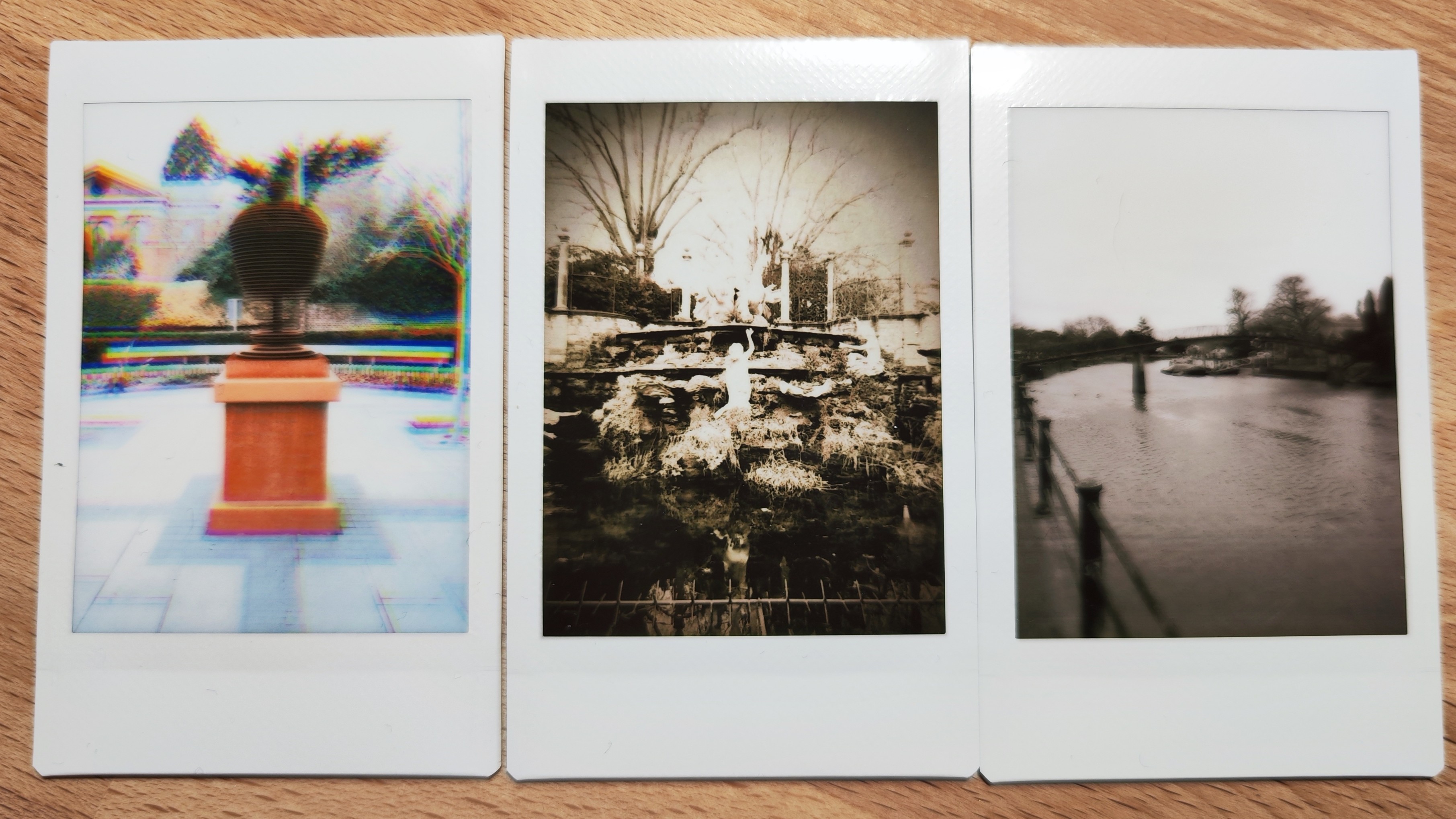 Instant photos on a wooden table