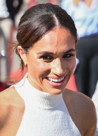 Meghan, Duchess of Sussex departs after a visit to town hall in Germany