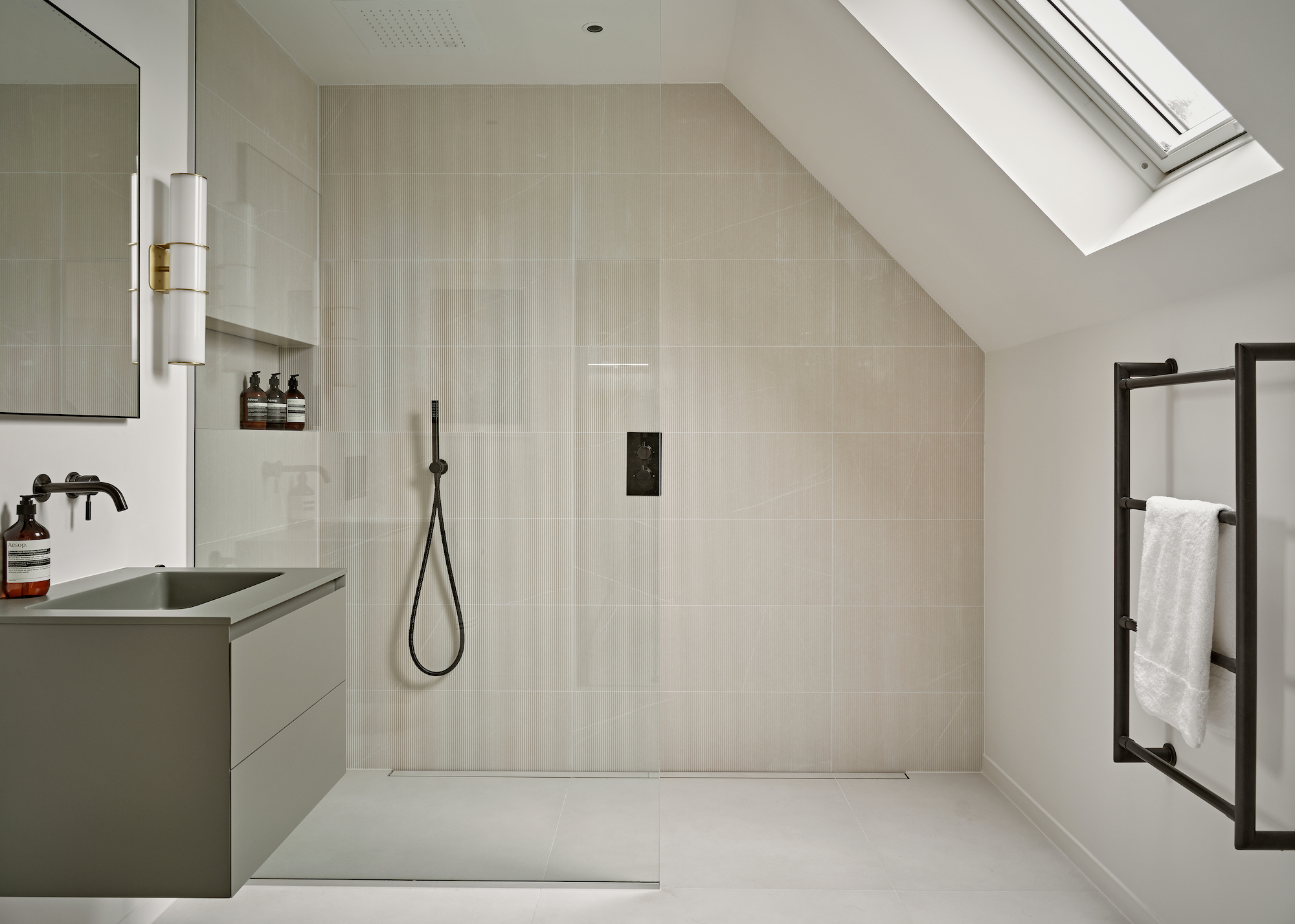 loft bathroom with large shower and black fittings