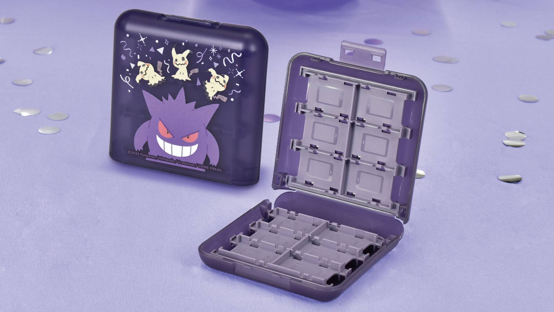 Official marketing image showing the inside of the game card case while sitting on a purple surface.