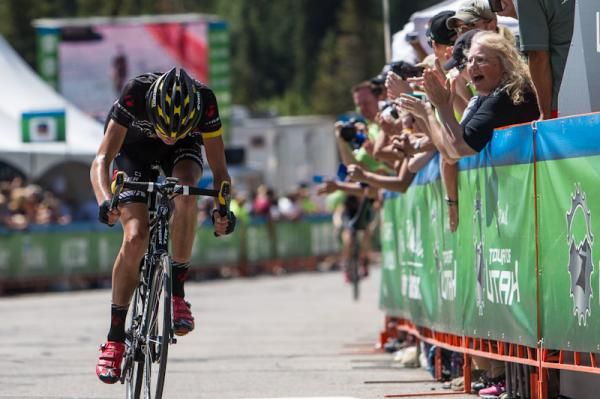 Joe Dombrowski (Bontrager-Livestrong) puts his down to make it across the line