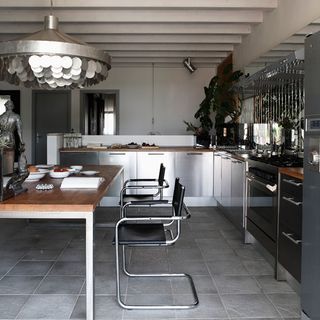 kitchen area with dining table and chair
