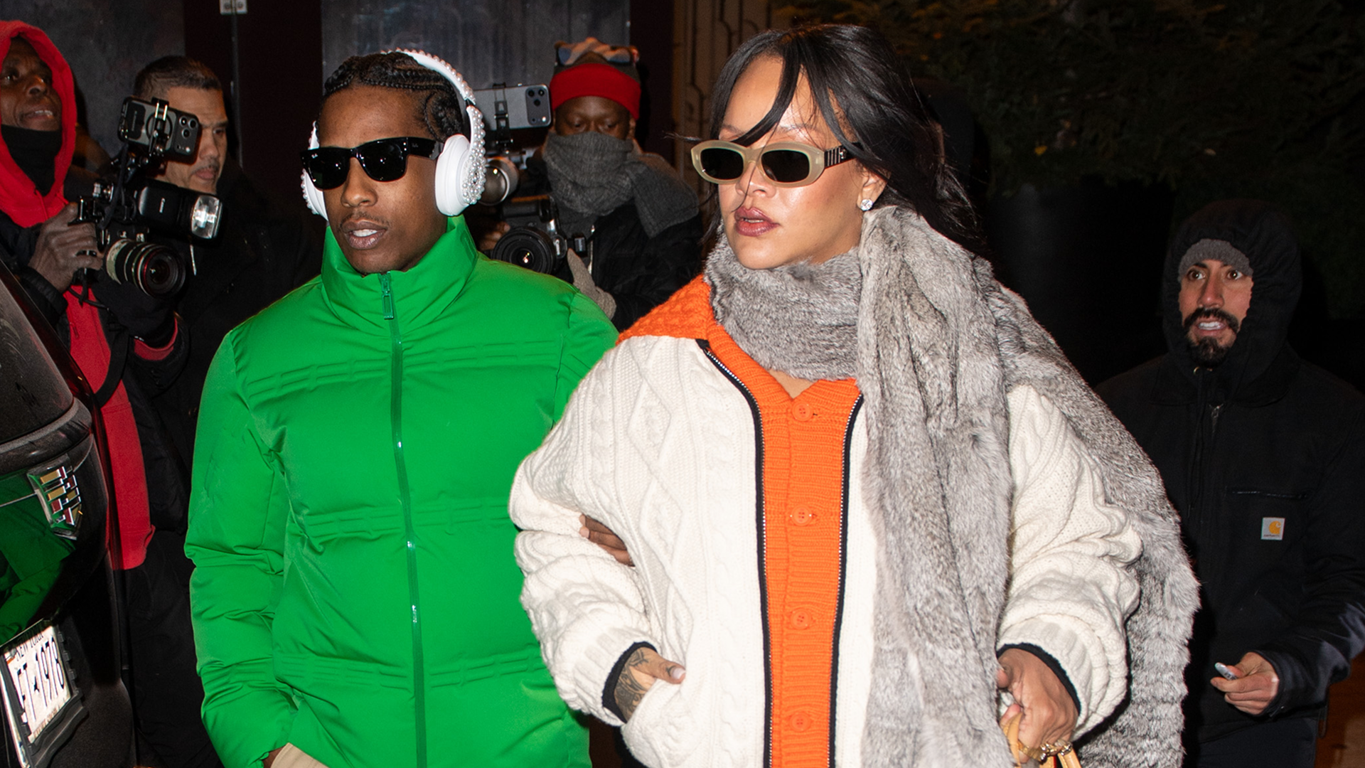 Rihanna was spotted with A$AP Rocky wearing an oversize cardigan with leggings and a Louis Vuitton bag