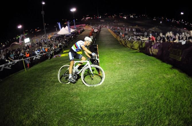 Sven Nys (Crelan-Euphony) rounds a corner alone after the barriers