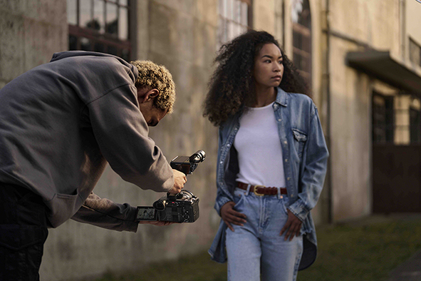 Cameraman with FX2 and a model