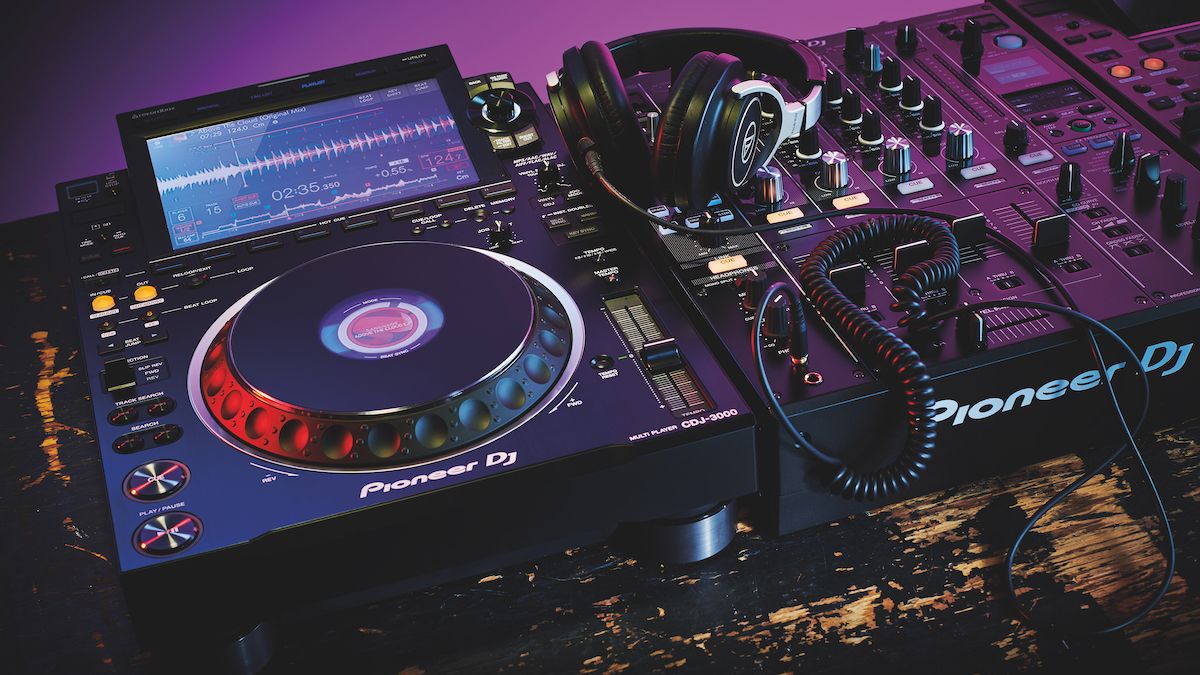 Pioneer DJ CDJ-3000 connected to a controller and headphones