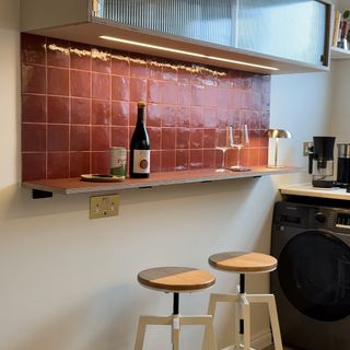 Bar area with red tiles in plykea kitchen