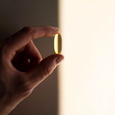 A grapefruit and some vitamins