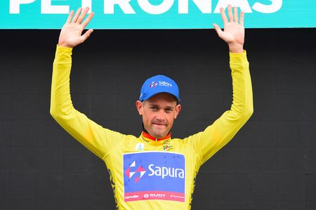 Ben Dyball (Sapura) pulls on the yellow jersey on stage 4 of the Tour de Langkawi