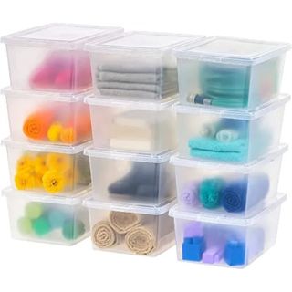 12 clear plastic boxes stacked in three columns of four with rainbow-organized items inside. 