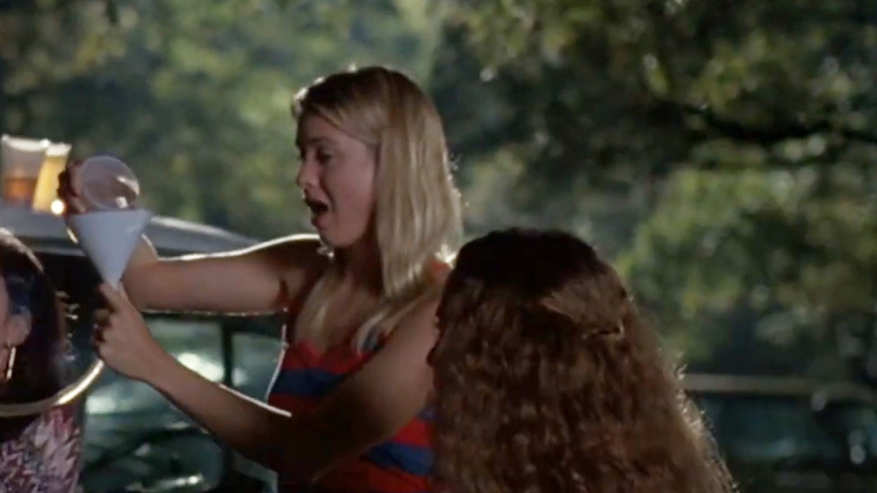 Renee Zellweger in a striped shirt in Dazed And Confused.