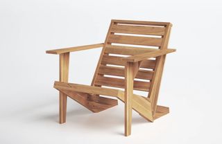 A wooden Adirondack lounge chair